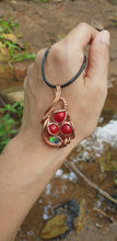 Load and play video in Gallery viewer, Rich Red Natural Saga Seeds Adorned with Aurora Opal Doublet Pendant
