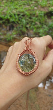 Load and play video in Gallery viewer, Gray Iridescent Round Cabochon Labradorite Wire Wrapped Amulet Pendant
