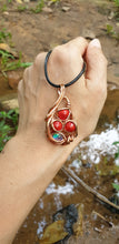 Load image into Gallery viewer, Rich Red Natural Saga Seeds Adorned with Aurora Opal Doublet Pendant
