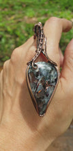 Load and play video in Gallery viewer, Astrophyllite Wire Wrapped Pendant
