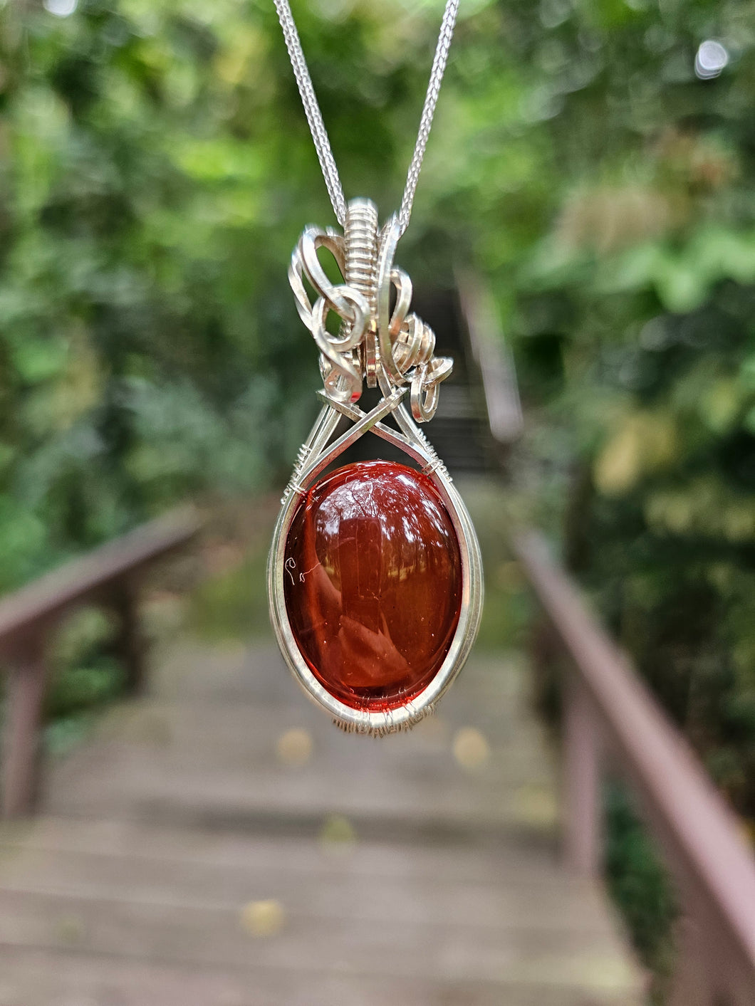 Rare Ruby-Red Coloured Amber Pendant set in Sterling Silver