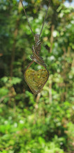 Load and play video in Gallery viewer, Baltic Heart-Shaped Amber Wrapped in Sterling Silver Pendant
