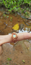 Load and play video in Gallery viewer, Iridescent Welo Opal Wire Wrapped Ring
