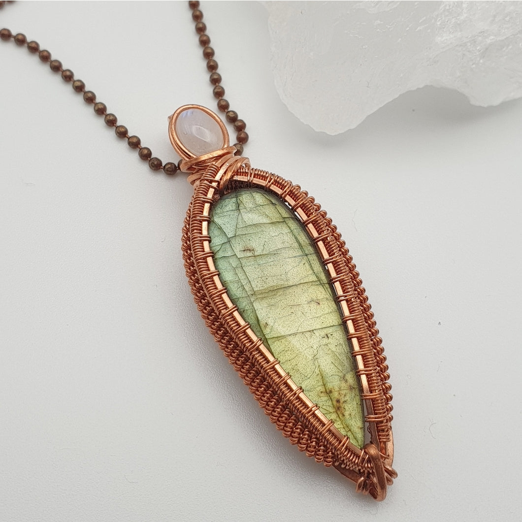 Pear-shaped Labradorite accented with a Blue Flash Moonstone Pendant 