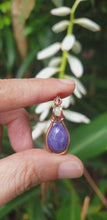 Load and play video in Gallery viewer, Morado Opal Cabochon Gemstone Accented with a Small Round Ethiopian Opal at the Bail Wire Wrapped Pendant/Necklace

